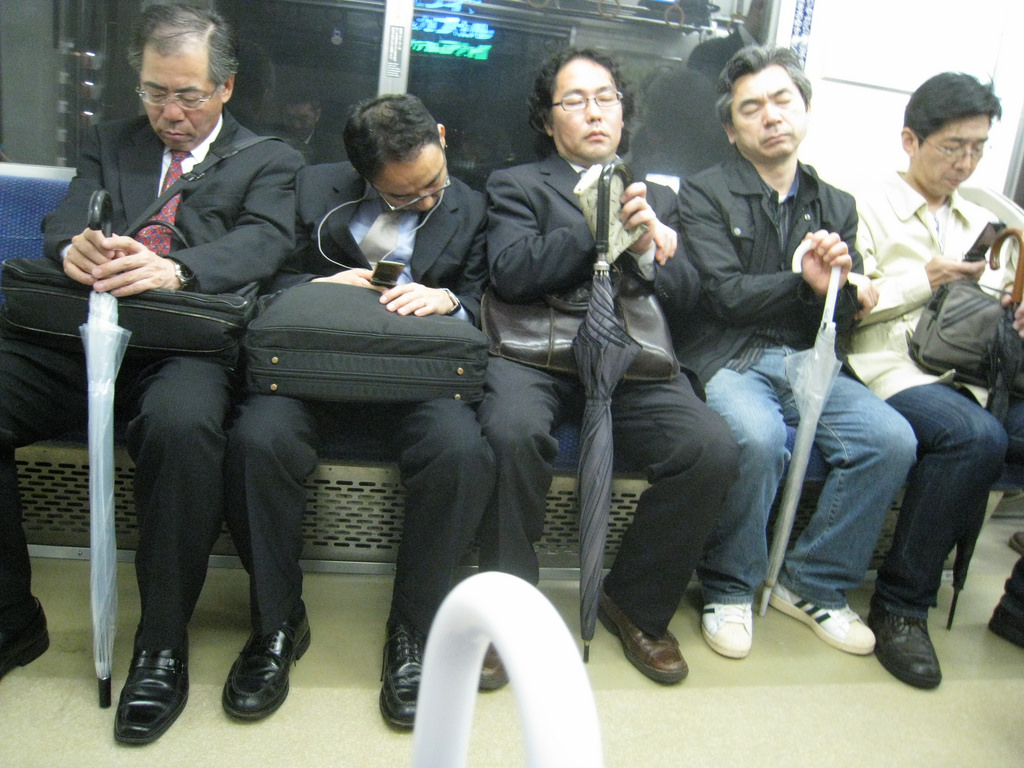 Japanese locals sleeping at work