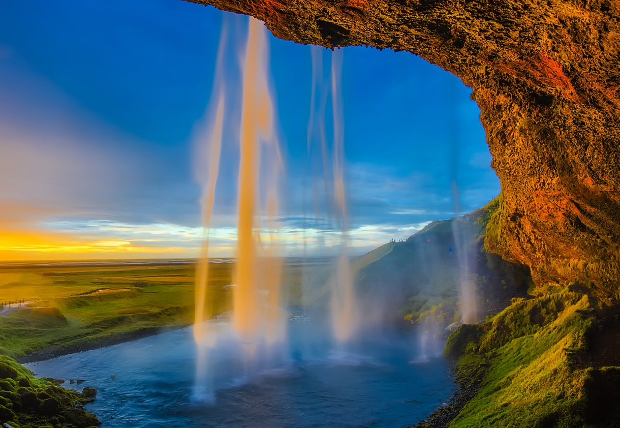 april iceland sunset and waterfall